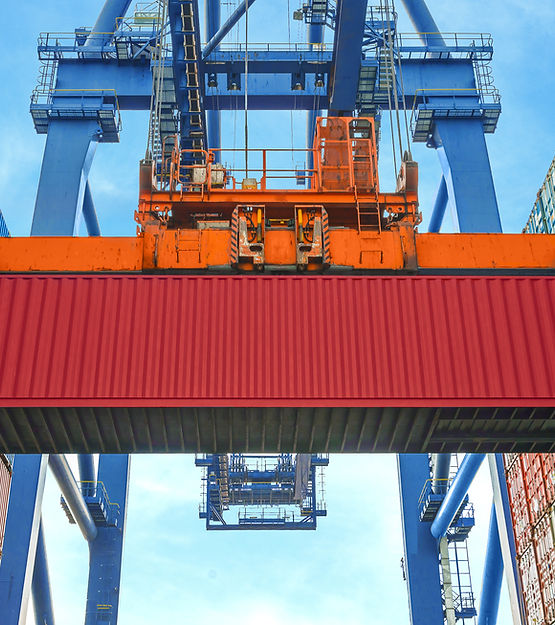 A Crane Lifting a Container